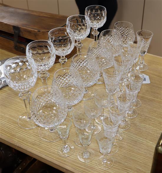 Five Waterford glass long stemmed goblets, six Waterford brandy glasses, ten Waterford liqueur and sherry glasses and other glasses